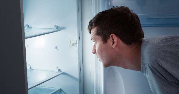 Man looking in the fridge